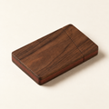 Closed walnut business card case with contrasting burgundy-brown side stripe
