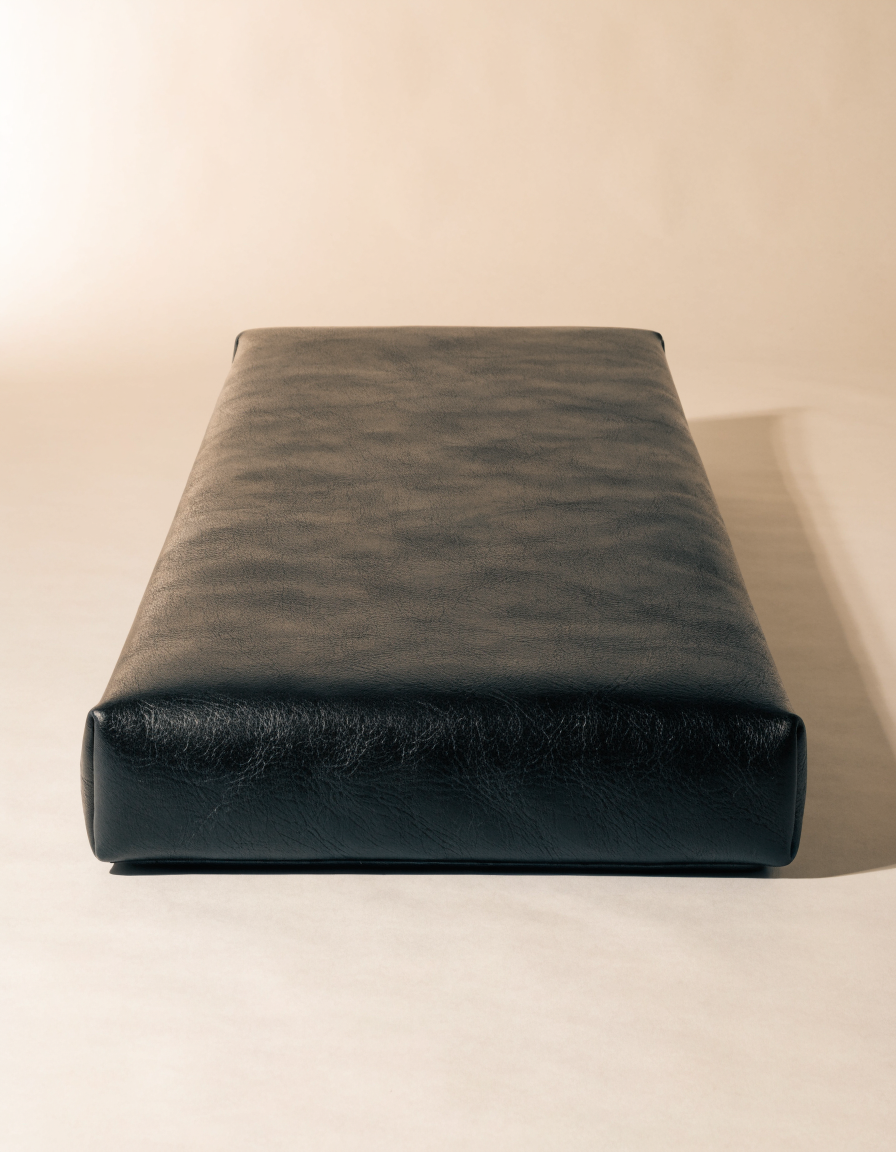Ground Charge Pad — 900 × 420 mm leather desk pad with a 10 W charging zone.