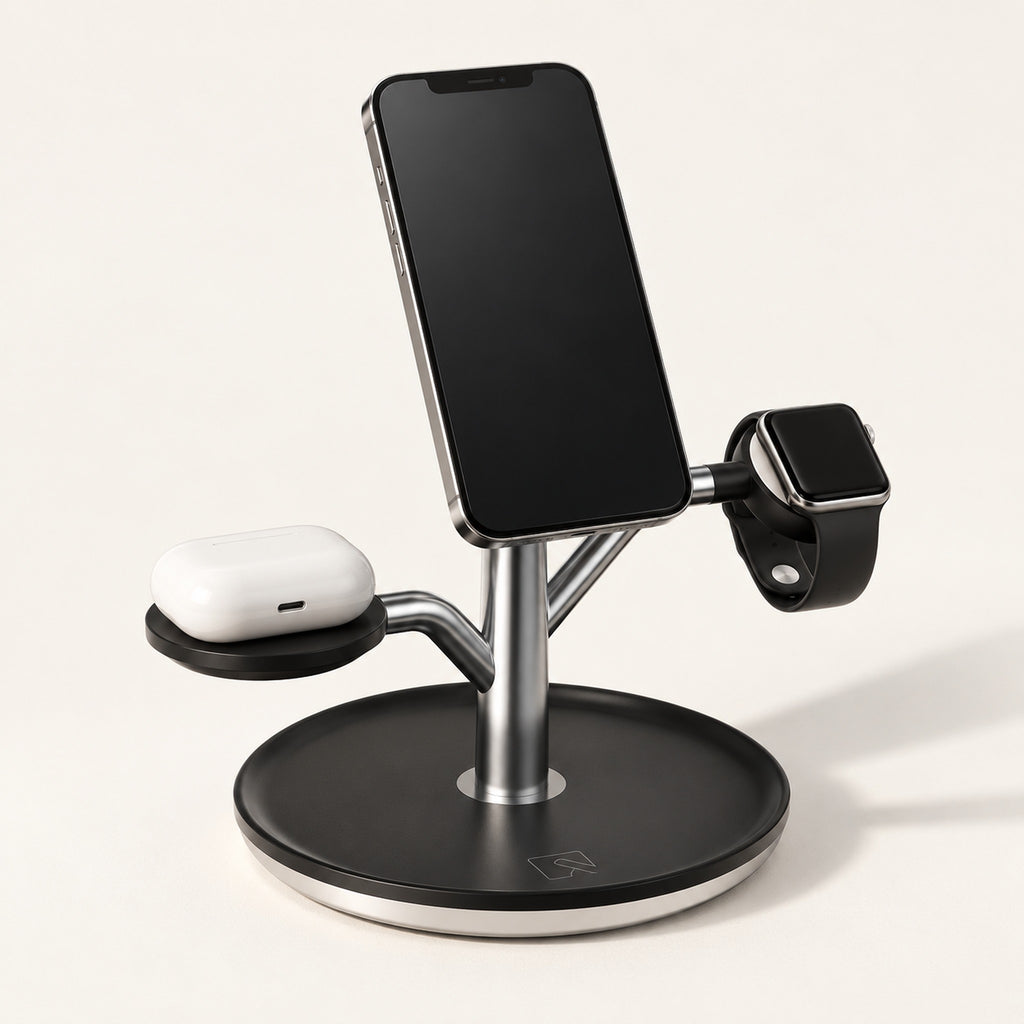Black Charge Tree holding a phone, watch and earbud case on a warm off-white background.